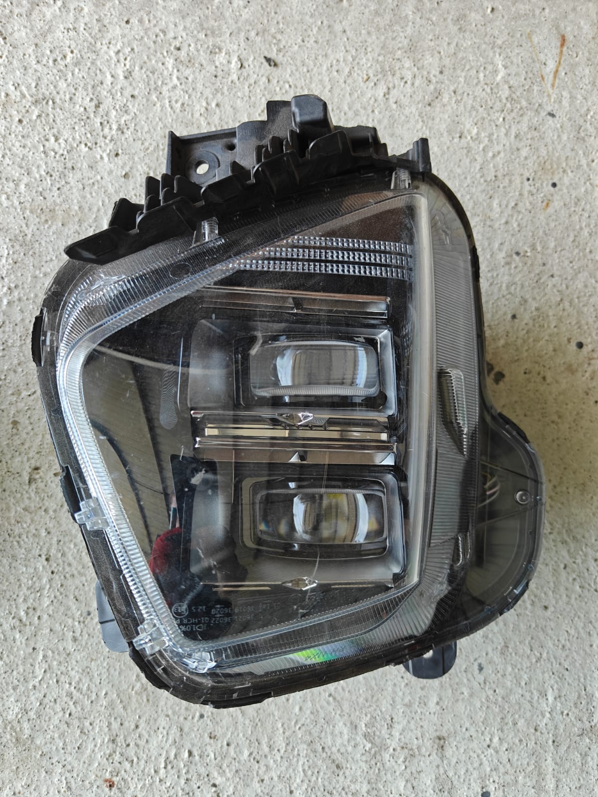 Hyundai Tucson 2021-2024 მარცხენა ორლინზიანი წინა ფარი — კოდი 250 მთავარი ფოტო